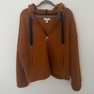 Burnt orange jacket with o-ring zip